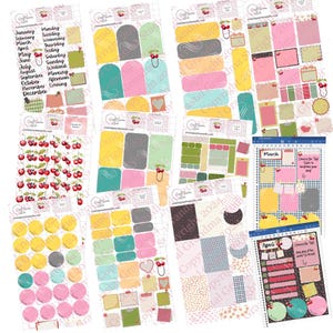 May include: A collection of colorful planner stickers featuring various shapes, including circles, rectangles, and labels. The stickers have a cherry theme and include months, days of the week, and decorative elements. The color palette includes pink, yellow, green, and blue.