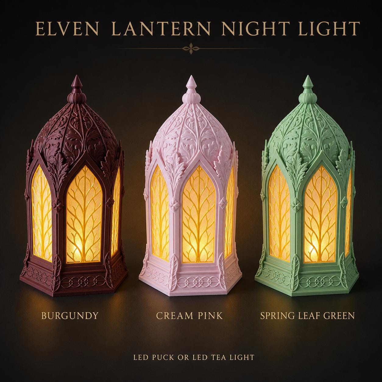 Three Elven Lantern Night Lights in burgundy, cream pink, and spring leaf green colors, each with a LED puck or tea light.