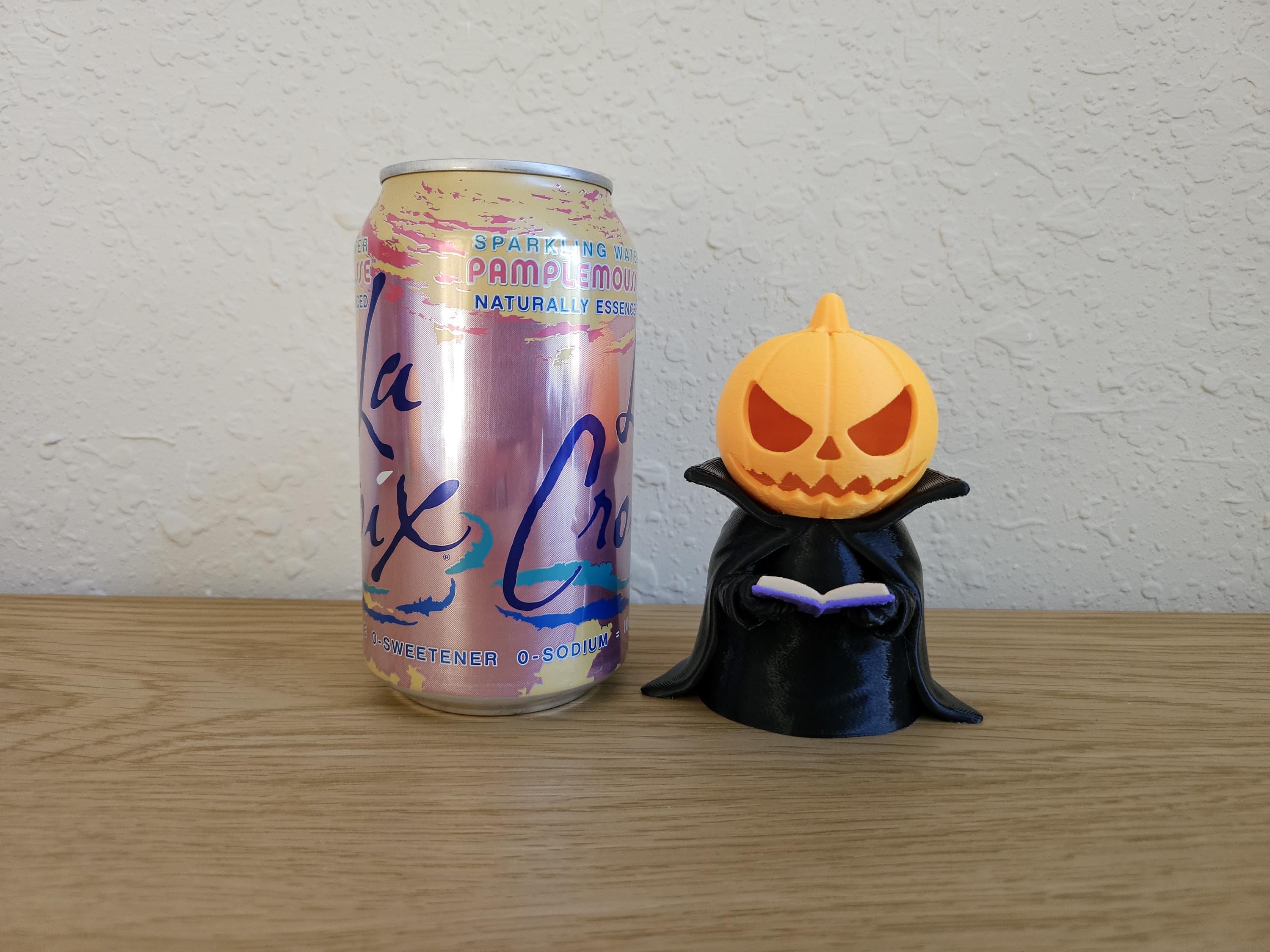 The Pagekeeper – Glowing Jack-o-Lantern Bookkeeper Figurine (4″) with Tealight Candle