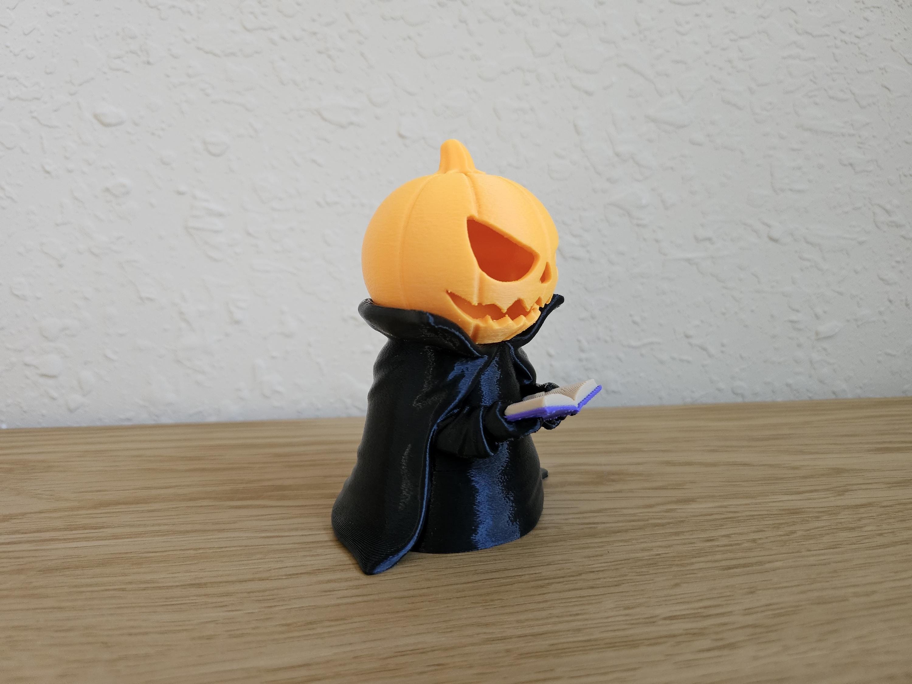The Pagekeeper – Glowing Jack-o-Lantern Bookkeeper Figurine (4″) with Tealight Candle