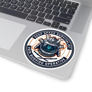 May include: A round sticker with a futuristic samurai helmet design. The sticker features the text "DEEP SPACE SURVIVALIST" and "VOID BUSHIDO OPERATIVE" in a circular layout, with a blue and orange color scheme.