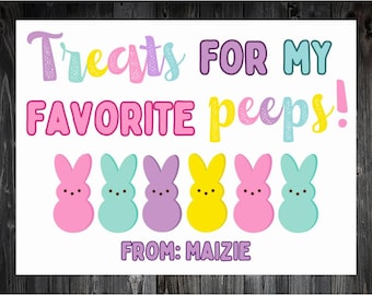 May include: A colorful Easter-themed print with the text "Treats FOR MY FAVORITE peeps!" and "FROM: MAIZIE." The design features six marshmallow bunny figures in pink, blue, purple, and yellow. The text is in various colors, including pink, purple, and yellow.