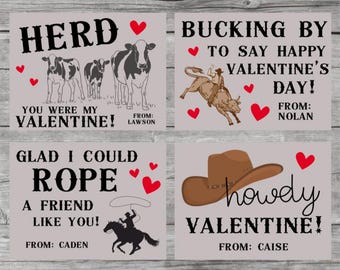May include: Four Valentine's Day cards with a Western theme. One card says "HERD" with cows, another says "BUCKING BY" with a cowboy on a bull, a third says "GLAD I COULD ROPE" with a cowboy on a horse, and the last says "howdy VALENTINE!" with a cowboy hat.
