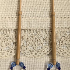 Pair of basic wooden spangled lace bobbins