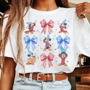 ディズニー ミッキー ソーサラー ファンタジア コケット ボウ Tシャツ、ディズニー マッチング ファミリー シャツ、ミッキー ファンタジア ファンタズミック ハリウッド スタジオ トリップ Tシャツ
