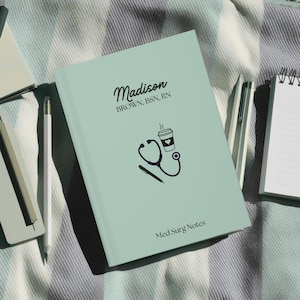 May include: A light green notebook with the text "Madison BROWN, BSN, RN" and "Med Surg Notes". The notebook has a stethoscope, a coffee cup, and a pen drawn on it.