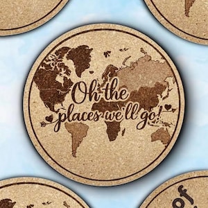 May include: Set of round coasters with a world map design. The coasters are made of a light brown material and feature the phrase "Oh the places we'll go!" in a decorative font. The set includes 4 or 6 coasters.