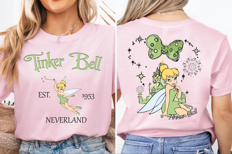 a woman wearing a pink shirt with tinkerbell on it
