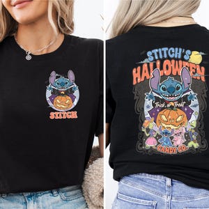 a woman wearing a black shirt with an image of a cartoon character on it