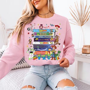 Disney All Characters Books Sweatshirt, Toy Sory And Lion King Library Shirt, Fantasy Bookish Club Sweater, Disneyworld Book Lover Gift Tee