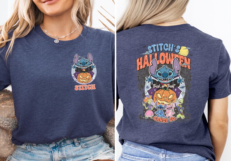 a woman wearing a halloween t - shirt and denim shorts