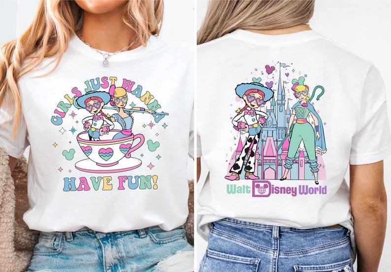 a woman wearing a white shirt with a picture of a cartoon character on it