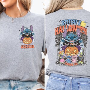 a woman wearing a t - shirt with an image of a cartoon character on it