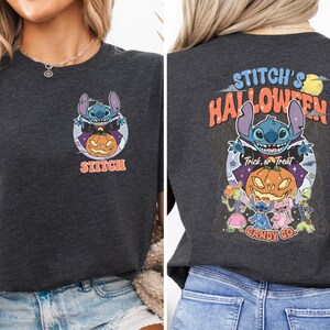 a woman wearing a black halloween t - shirt