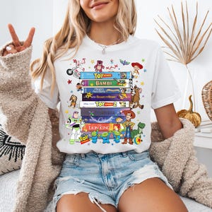 Disney All Characters Books Sweatshirt, Toy Sory And Lion King Library Shirt, Fantasy Bookish Club Sweater, Disneyworld Book Lover Gift Tee