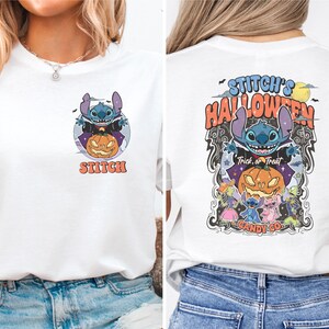 a woman wearing a white t - shirt with a cartoon character on it