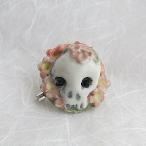 Porcelain skull with little flowers brooch,  day of the dead skull and flowers brooch, skull and flower hat badge,