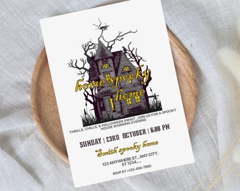 May include: A white invitation card with the text "Editable Invitation" at the top. The card features a spooky house illustration with the words "home's spooky home". Additional text includes event details and RSVP information.