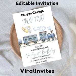 May include: A white invitation card with a train illustration, balloons, and text that reads "Chugga Chugga TWO TWO". The invitation is for a second birthday party, with details including the date, time, and location. The text "Editable Invitation" and "ViralInvites" are also present.