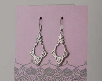 Medallion Sterling Silver Earrings, Cast design.