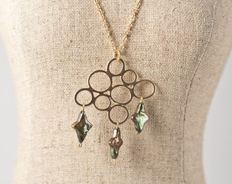Asymmetrical Circle necklace with Green diamond Freshwater Pearls
