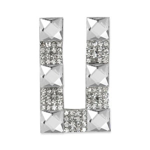 May include: A silver letter U made of rhinestones and clear glass squares.