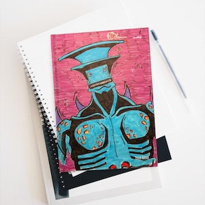 Cuaderno de tapa dura en blanco, azul mate, con diseño de personaje de robot de anime, ideal para dibujar y escribir. Regalo perfecto para fans otaku. Cuaderno con fondo rosa.
