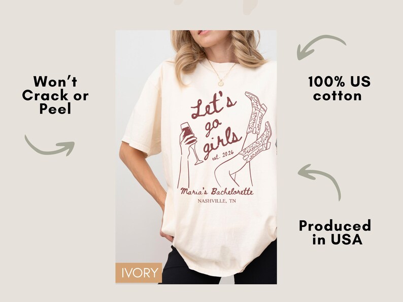 May include: Ivory-colored t-shirt with the text "Let's go girls est. 2024" and a graphic of a woman holding a glass of wine and cowboy boots. The shirt is made of 100% US cotton and is produced in the USA. The text "Maria's Bachelorette Nashville, TN" is also printed on the shirt.