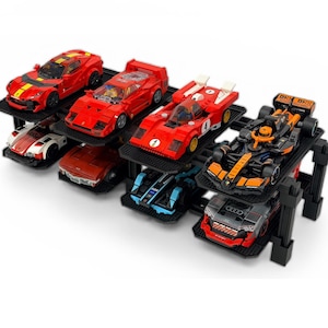 May include: A black multi-tiered display stand holding a collection of toy race cars. The cars are various colors, including red, orange, white, and blue. The stand is made of black plastic and has a grid-like surface.