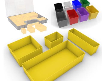 Puede incluir: Un organizador de plástico transparente con una base gris y compartimentos amarillos, junto con varios contenedores de almacenamiento amarillos y de colores individuales. Los contenedores son de varios colores, incluyendo negro, blanco, rojo, morado, azul, verde y amarillo.