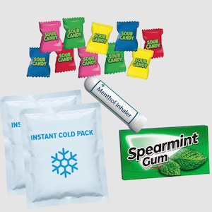May include: A collection of items including eleven individually wrapped sour candies in various colours, two white instant cold packs with blue snowflake icons, a white menthol inhaler, and a green rectangular box of spearmint gum.