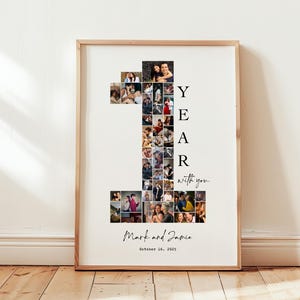Op de afbeelding: Een ingelijste fotocollage van een stel voor hun eerste jaar samen. De collage heeft de vorm van het nummer één, met het woord "YEAR" verticaal gespeld. De namen van het stel en de datum van hun huwelijk staan onder de collage. "Mark en Jamie, 16 oktober 2023"