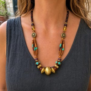 Three-piece handmade necklace set featuring rose gold and brown beaded necklace, rose gold and brown beaded necklace and rose gold and brown beaded necklace, displayed together to show the coordinated colors and beadwork