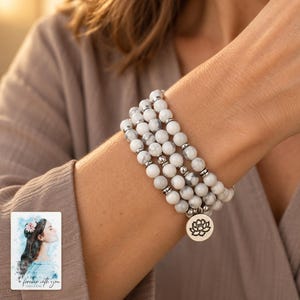White Bead Wrap Bracelet, worn with evening clothing. A sample personalized digital greeting card is shown alongside.
