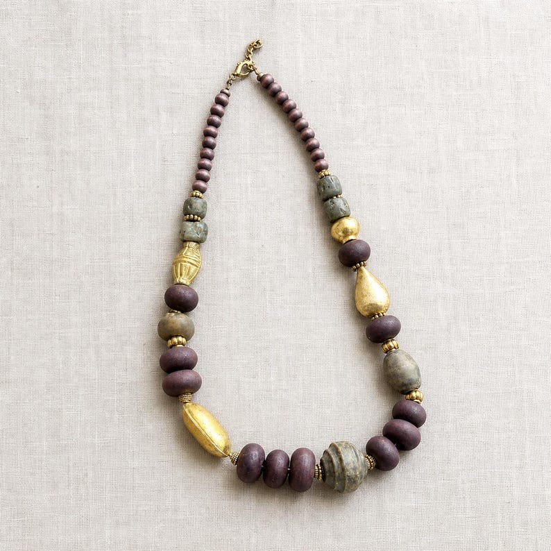 Green turquoise and coral statement beaded necklace with lotus charm from the four piece set
