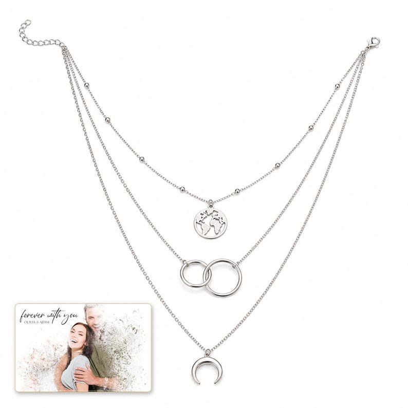 Silver Moon Map Layers shown during a believable gift-giving moment between adults with the exact jewelry visible.