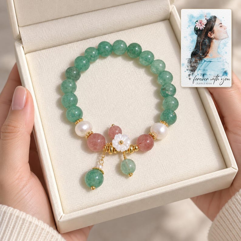 Forest Strawberry clear accents Bracelet shown during a believable gift-giving moment between adults with the jewelry visible. A personalized digital greeting card is shown alongside.