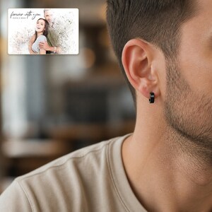 EdgeLine Stainless Huggie Hoops worn by an adult in a natural daytime lifestyle scene.