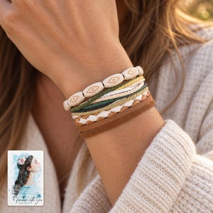 Layered Woven Bracelet, worn with evening clothing. A sample personalized digital greeting card is shown alongside.