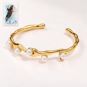 Gold Tone Cuff Bracelet, shown against a light background. A sample personalized digital greeting card is shown alongside.