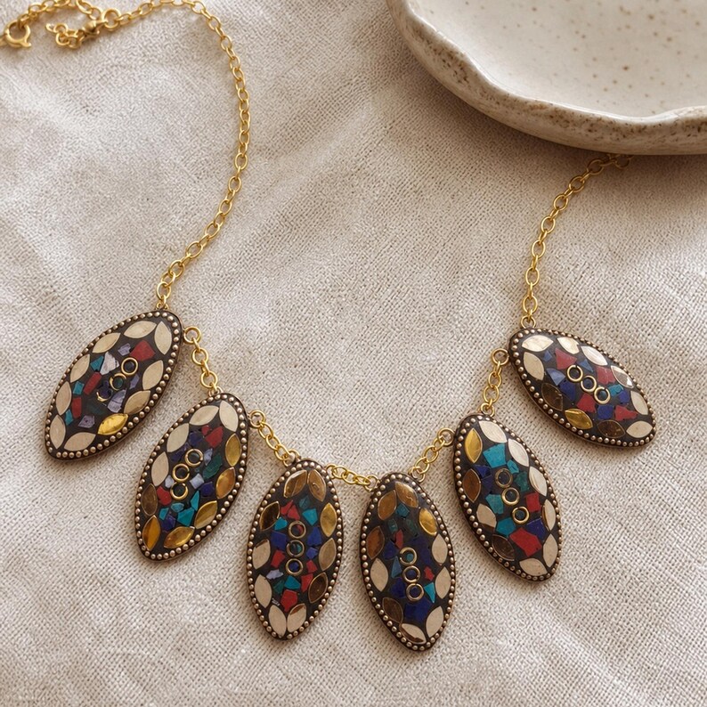 Three-piece handmade necklace set featuring rose gold and beige beaded necklace, rose gold and beige beaded necklace and rose gold and blue beaded necklace, displayed together to show the coordinated colors and beadwork