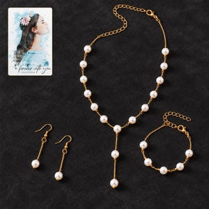 pearl style Occasion Jewelry Set styled against a dark luxury surface with the exact product finish clearly visible. A personalized digital greeting card is shown alongside.