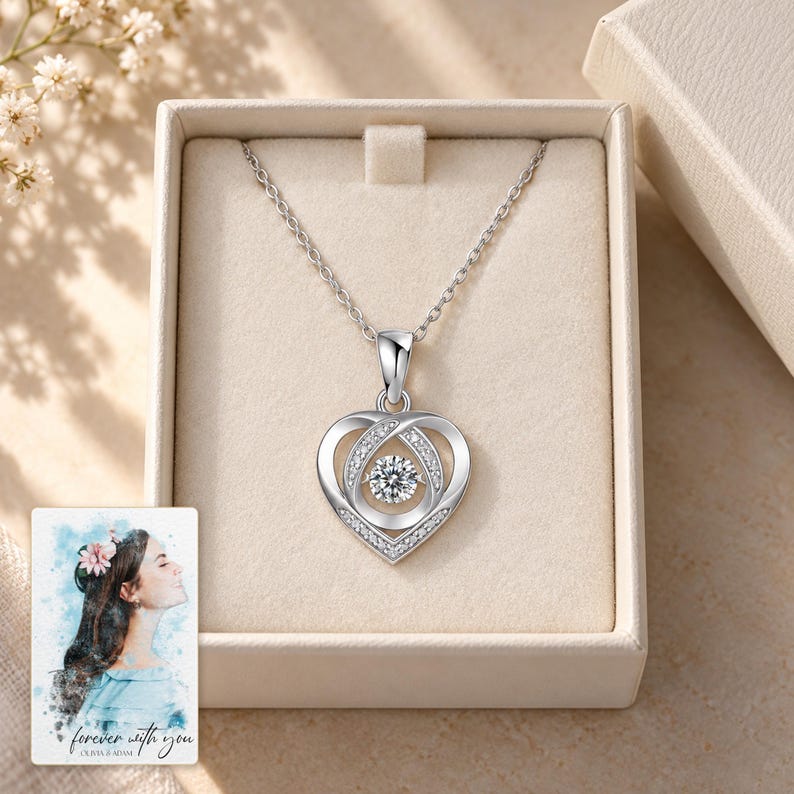 Moissanite Heart Necklace, gift box view. A personalized digital greeting card is shown alongside.