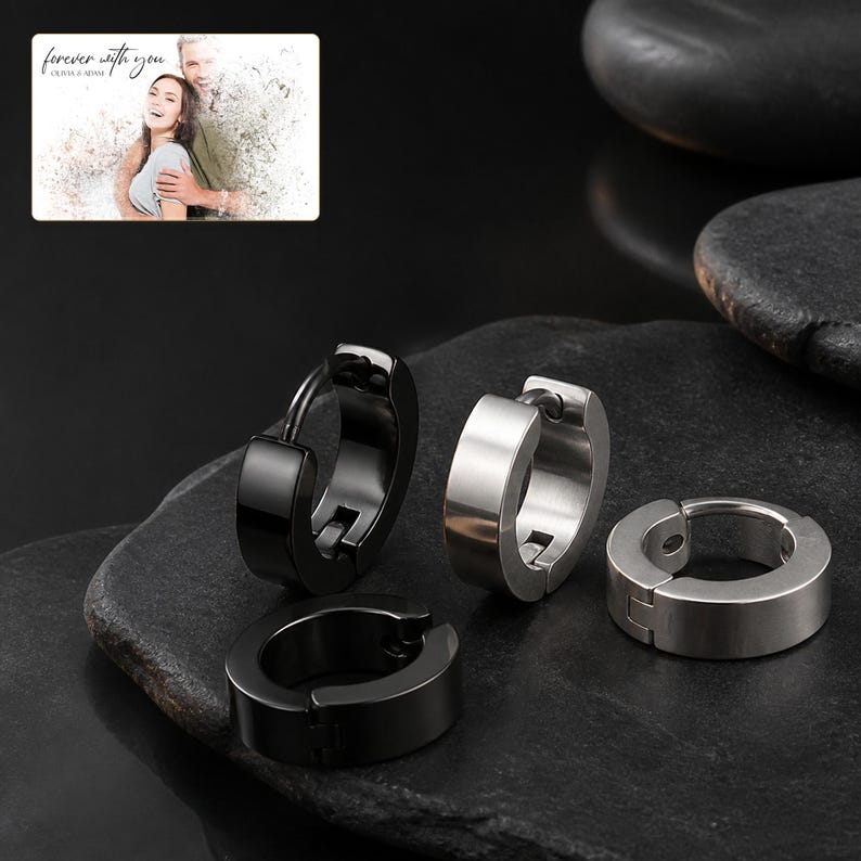 EdgeLine Stainless Huggie Hoops shown during a warm gift-receiving moment between adults with the exact jewelry visible.