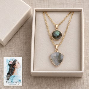Layered Shield Necklace, gift box view. A personalized digital greeting card is shown alongside.
