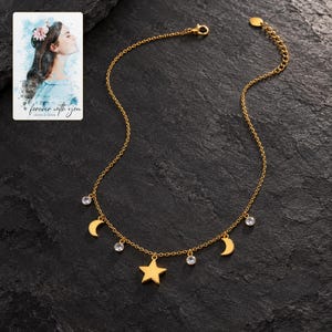 Moon and Star Necklace, shown against a dark background. A sample personalized digital greeting card is shown alongside.