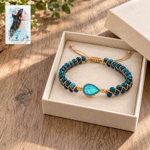 Blue Teardrop Cord Bracelet, displayed in a presentation box. A sample personalized digital greeting card is shown alongside.