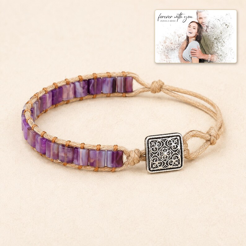 Purple rectangular-bead cord bracelet with a square decorative detail, display view. A personalized greeting-card example appears in the corner.