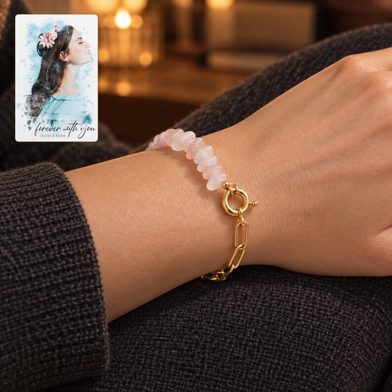 Pink chip bead bracelet with gold-tone paperclip links and a round clasp, worn on a wrist beside a personalized digital greeting card.