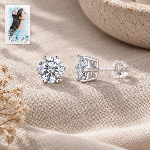 Moissanite Stud Earrings, laid on fabric. A sample personalized digital greeting card is shown alongside.
